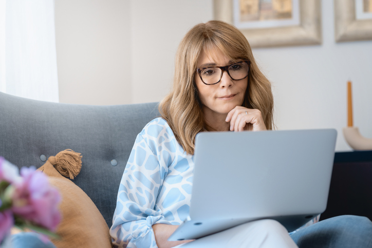 A woman reviewing her retirement plan.