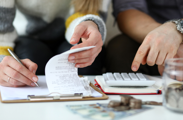 A couple reviewing their taxes.